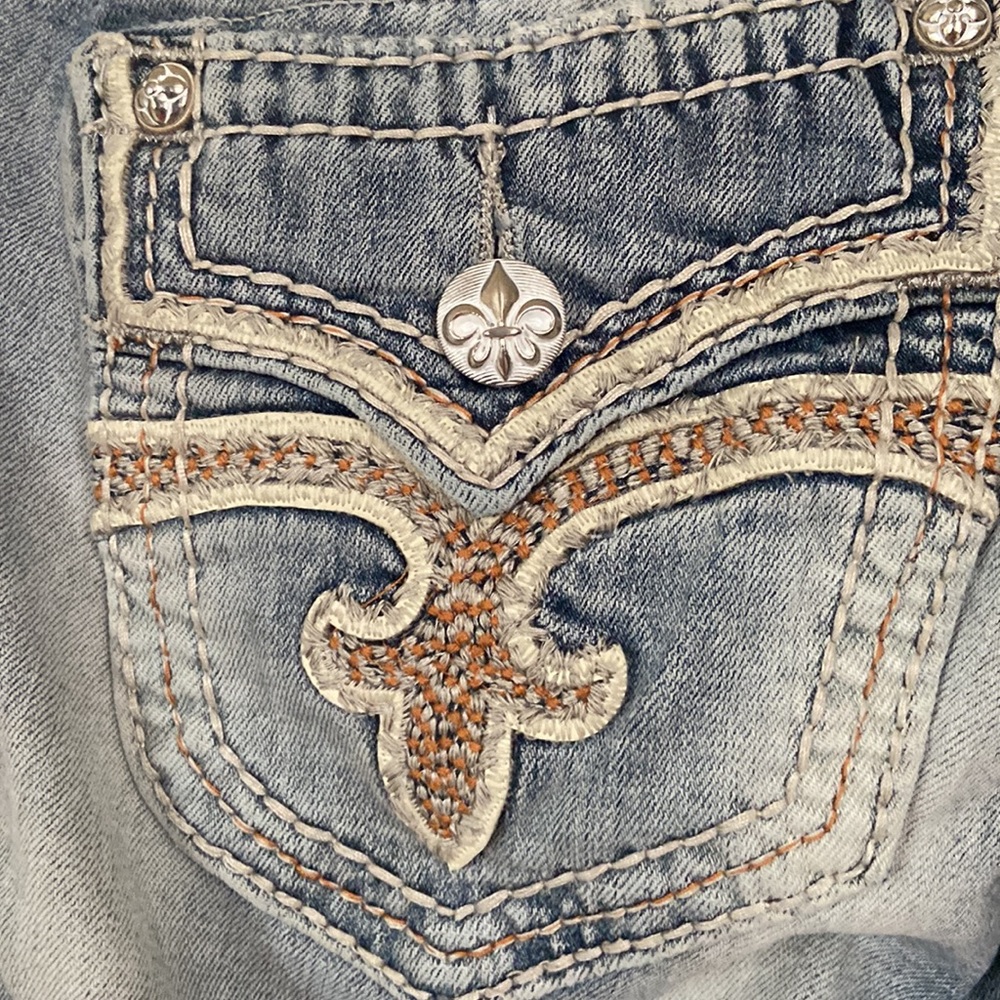 Rock Revival Skinny Jeans With orange and cream Houndstooth Inserts